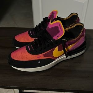 Nike waffle one size 12 fuscia colorway. Really nice